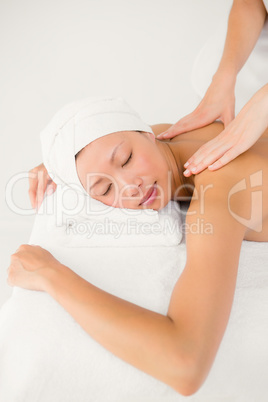 Attractive woman receiving back massage