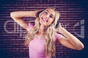 Portrait of a beautiful woman dancing with headphones