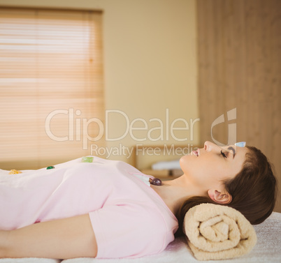 Young woman at crystal healing session