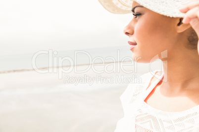 Stylish girl looking to the sea