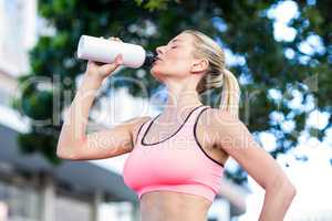 A beautiful woman drinking water