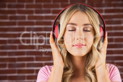 Close up of a woman listening to music