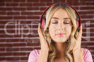 Close up of a woman listening to music