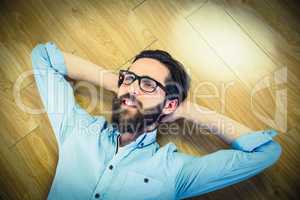 Handsome hipster lying and smiling