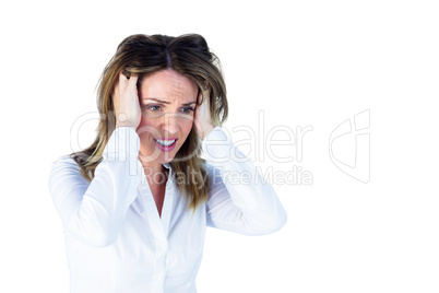 Stressed businesswoman with hands on her head