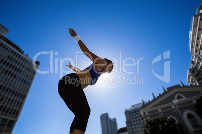 Athletic woman preparing for jump