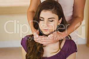 Young woman having a reiki treatment