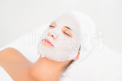 Beautiful brunette getting a facial treatment