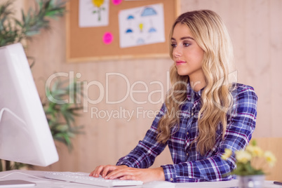 Pretty casual worker at her desk