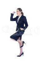 Pretty businesswoman doing a running victory pose
