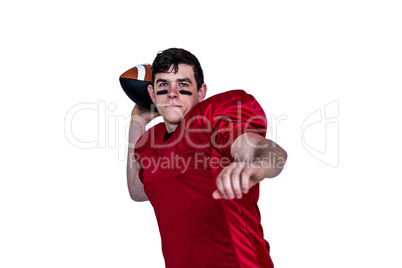 American football player throwing a ball