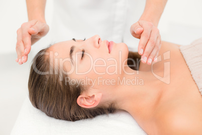 Beautiful young woman on massage table