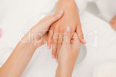 A hands applying a cream