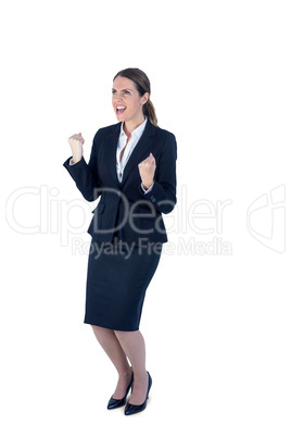 A businesswoman cheering and yelling