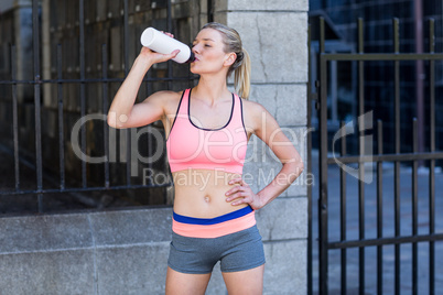 A beautiful woman drinking water