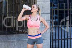 A beautiful woman drinking water