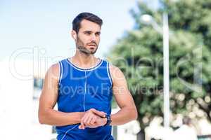 An handsome athlete looking away