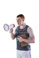 Angry personal trainer yelling through megaphone