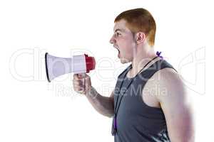 Angry personal trainer yelling through megaphone