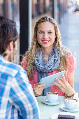 couple looking at the tablet