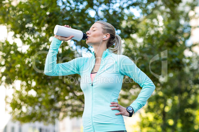 A beautiful woman drinking water