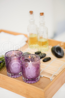 Massage tray with candles and stones