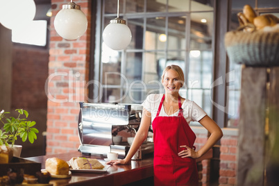 Pretty barista looking at the camera