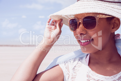 Stylish woman in hat and sunglasses