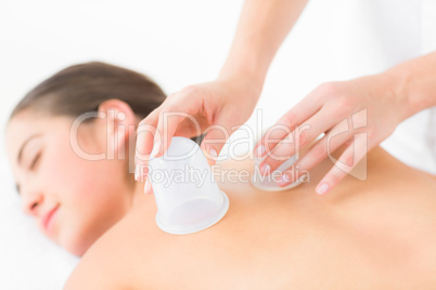 Pretty woman enjoying suction massage