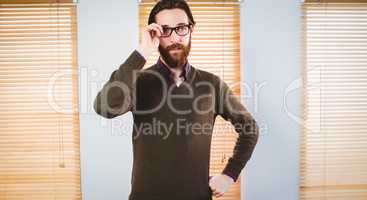 Hipster businessman looking at camera