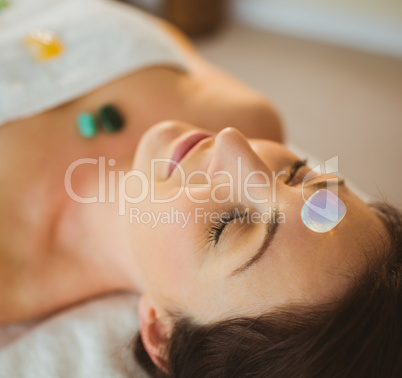 Young woman at crystal healing session