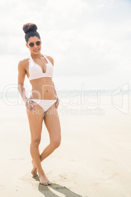 Fit woman in white bikini