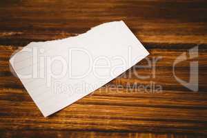 Scrap of paper on wooden table