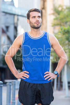 An handsome athlete looking away