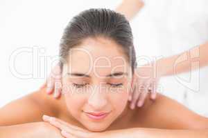 Pretty woman enjoying a shoulder massage