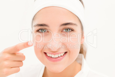 portrait eautiful smiling woman Mid section of woman applying cr