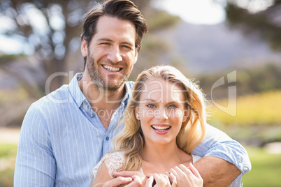 Cute couple on date looking at the camera