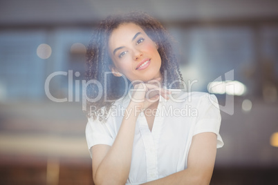 Carefree woman with arms folded