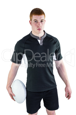 Rugby player holding a rugby ball