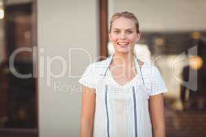 Blonde pretty waitress smiling