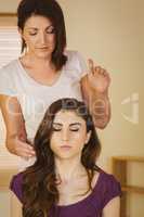 Young woman having a reiki treatment