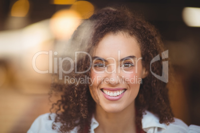 Smiling waitress looking at the camera