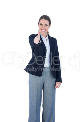 Portrait of a woman with thumbs up