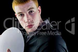 Rugby player holding a rugby ball