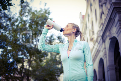 A beautiful woman drinking water