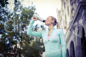 A beautiful woman drinking water