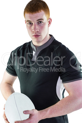Rugby player holding a rugby ball Rugby player holding a rugby ball