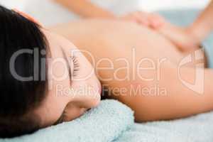 Beautiful woman on massage table