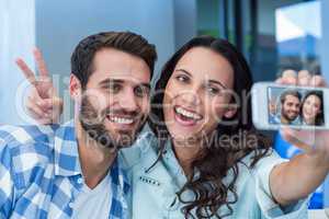 Young happy couple making a selfie