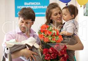 Family in the maternity hospital with newborn